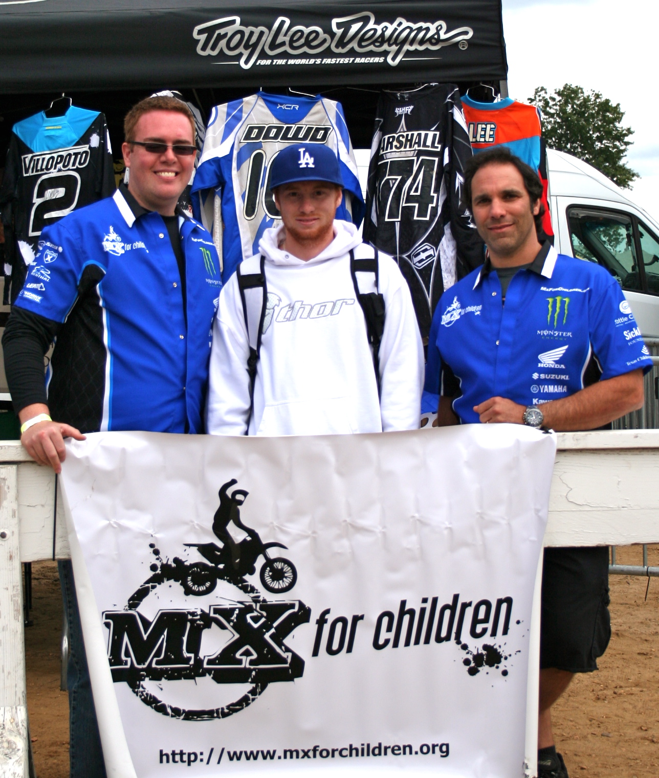 Manny Alvelo, Ryan Villopoto, and Marc Grossman at the MX for Children auction at the Kawasaki Race of Champions.